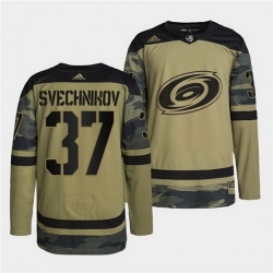 Men Carolina Hurricanes 37 Andrei Svechnikov 2022 Camo Military Appreciation Night Stitched jersey